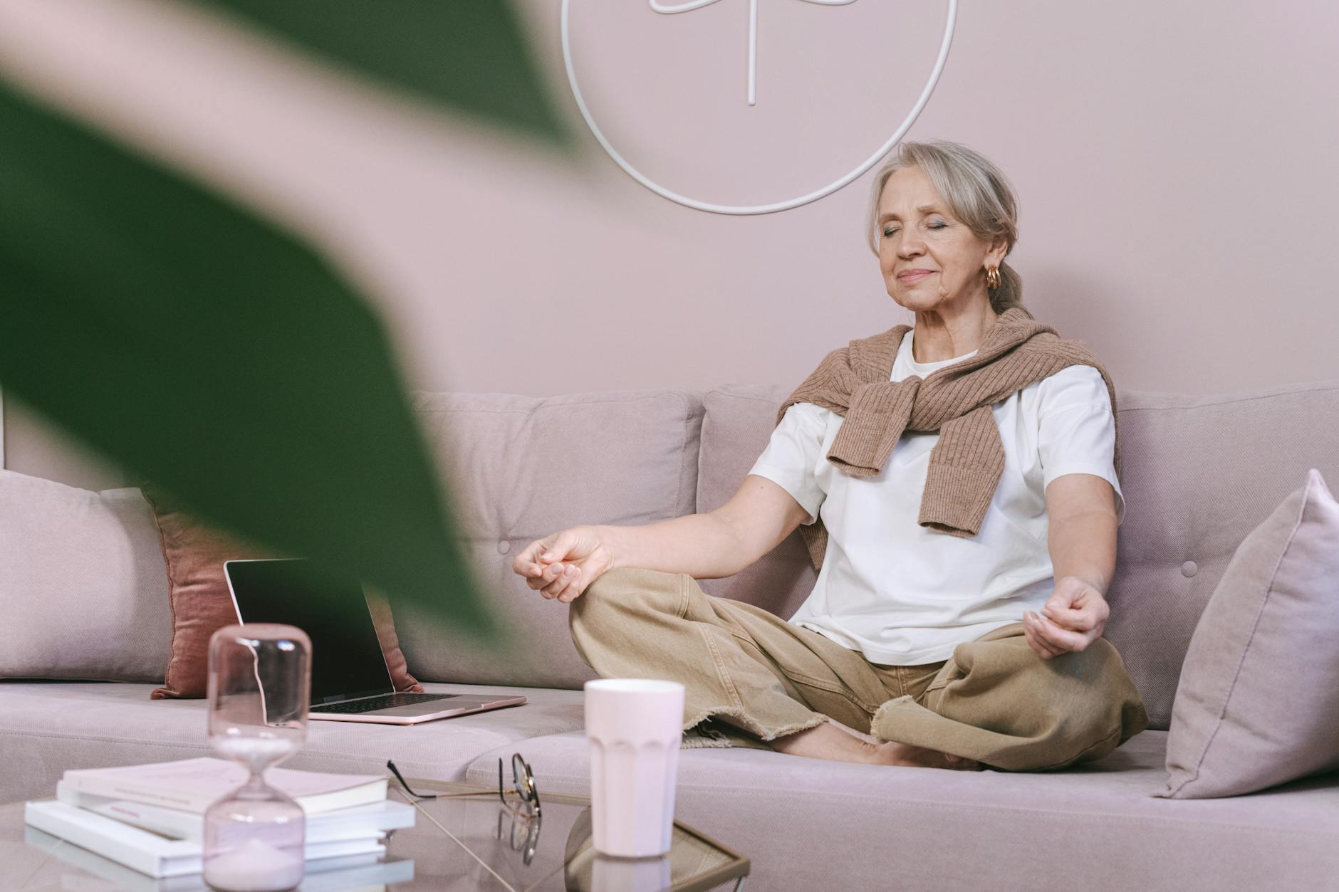 Woman practicing mindfulness and meditation for mental wellness support via telehealth in California